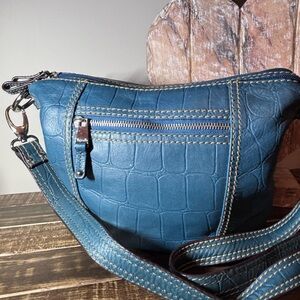 Tignanello blue genuine leather crossbody bag featuring a croc-embossed texture